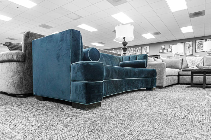 Side profile of the Rodeo Tuxedo Sofa, emphasizing its sculptural curves, bold silhouette, and elevated, modern elegance.
