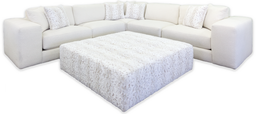 Luxurious white sectional sofa paired with a textured ottoman, perfect for creating your dream modular seating arrangement.