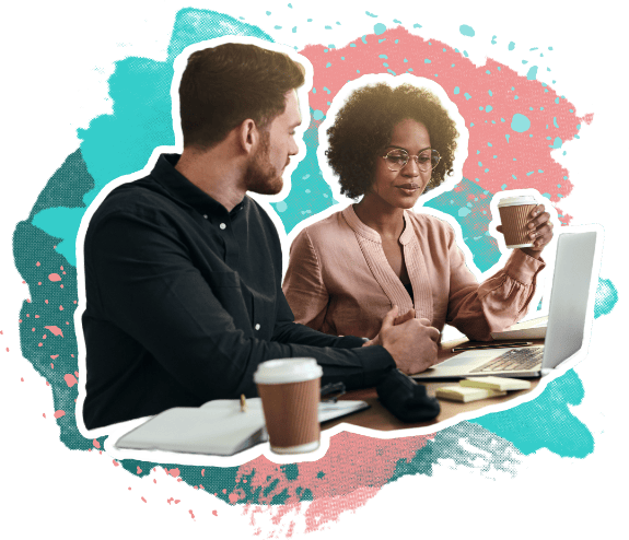 Business owner and client reviewing strategy together over coffee and a laptop