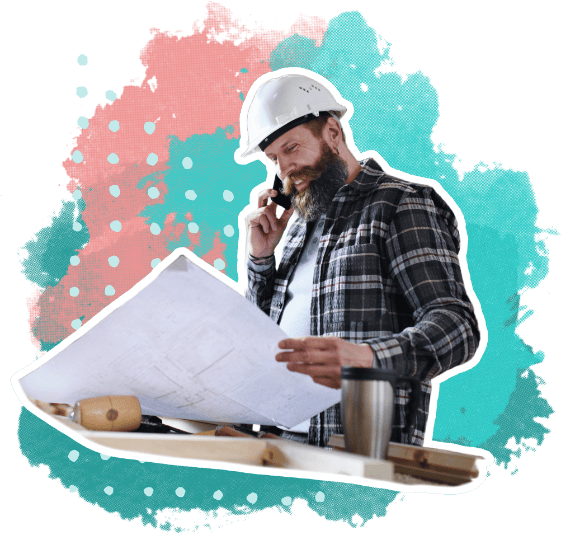 Contractor business owner reviewing blueprints while on the phone